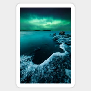 Ice on the lake shore and northern lights landscape Sticker